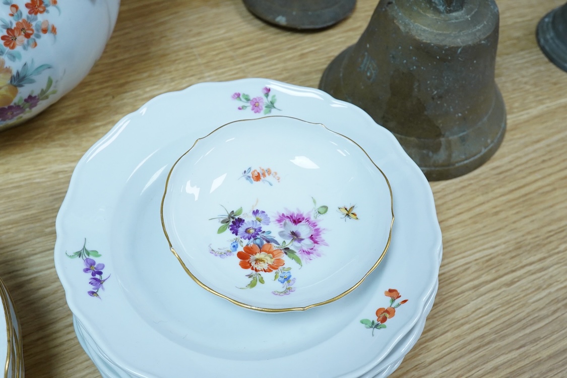 A collection of Meissen porcelain to include floral side plates and a German floral encrusted pot, 18cm high